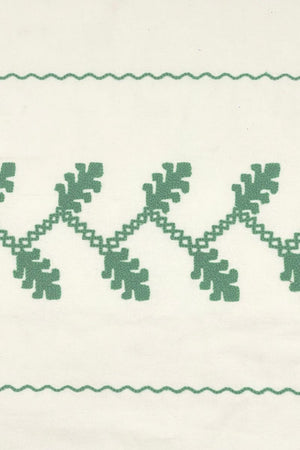Green embroidered tablecloth