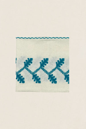 Serviette brodée turquoise