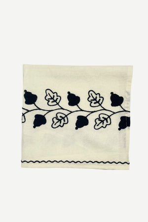 Serviette brodée feuille noire